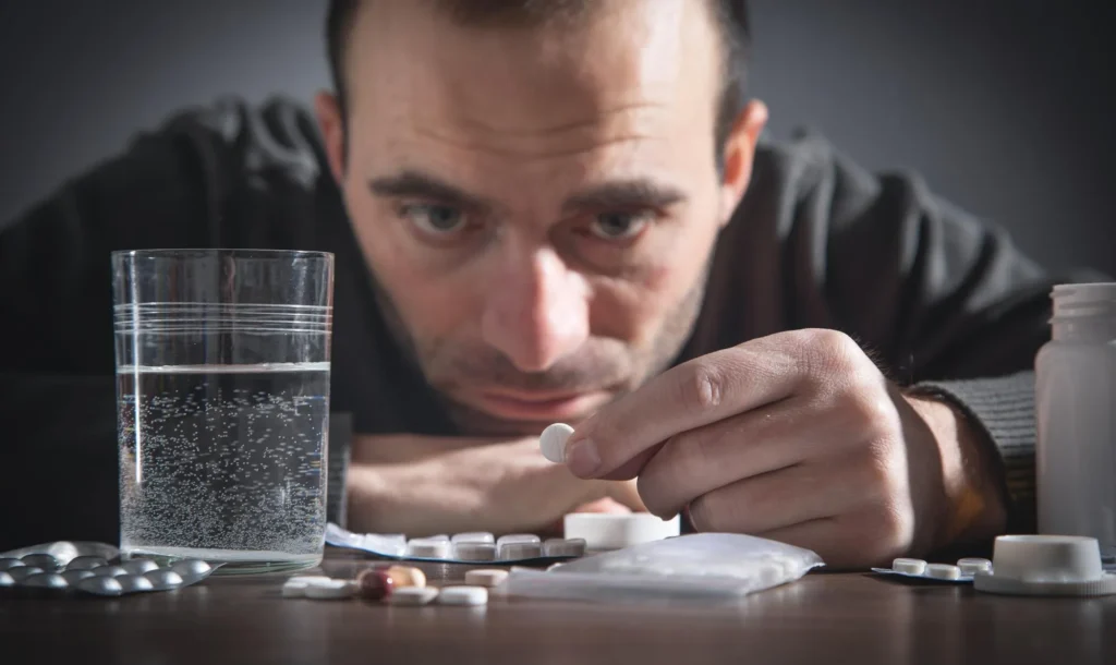A man is addicted to pills and requires residential treatment at The Encino Detox; call us if you're in need of help.  