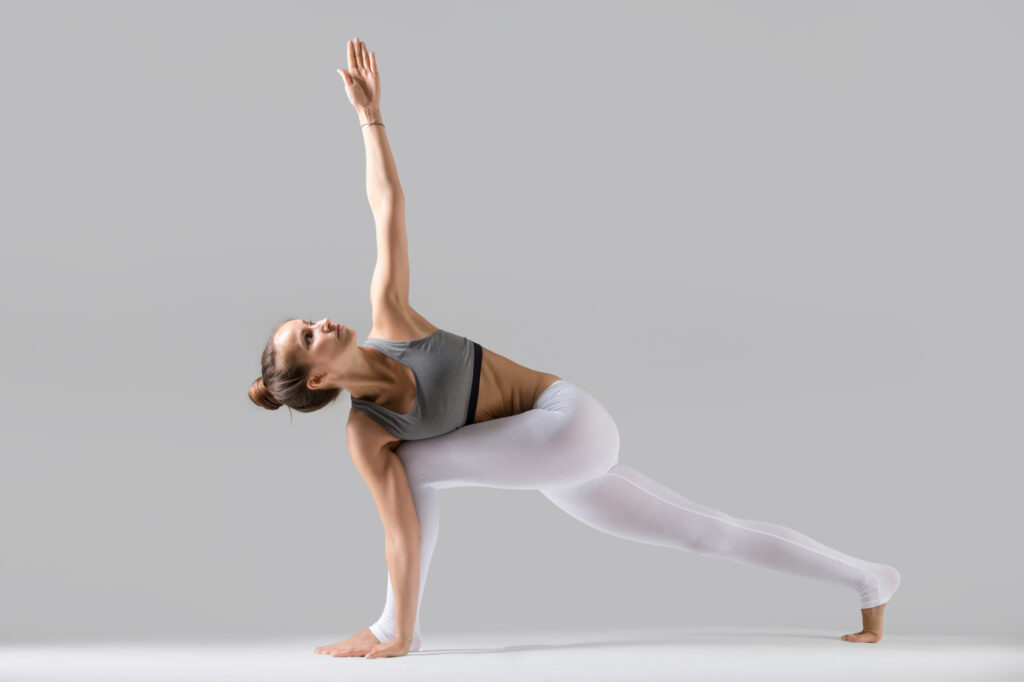 woman-practicing-yoga-with-extended-triangle-pose